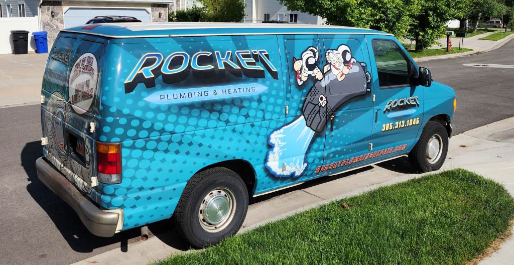 An Image of a Van that has a Company Logo wrap of the Salt Lake City Based Rocket Plumbing Heating and Air Conditioning on It.